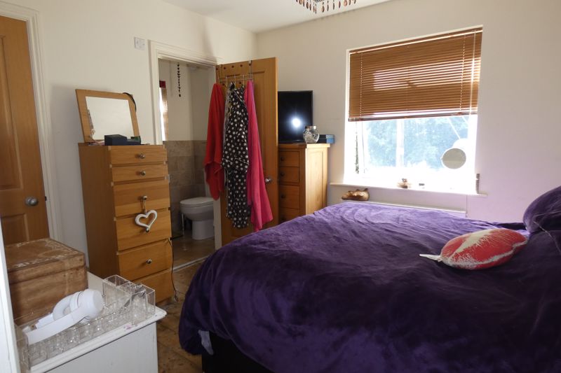 Bedroom One- click for photo gallery